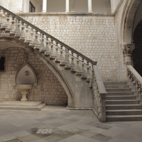 Stone staircase and courtyard.